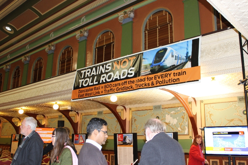 Trains Not Toll Roads Campaign banner