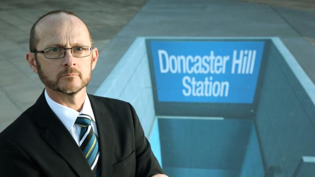 Manningham Mayor Paul McLeigh with a mock-up of a Doncaster Rail station. Picture: Janine Eastgate